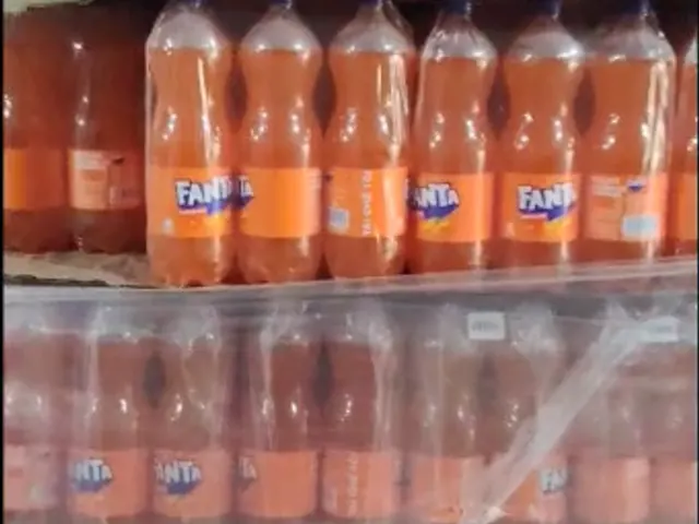 Rows of bottled beverages on a pallet